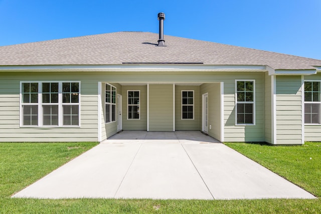 1253 Elbron Dr, Augusta, GA 30909 - back of house with a yard and roof with shingles