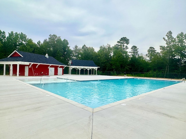 1253 Elbron Dr, Augusta, GA 30909 - community pool with a patio and view of scattered trees