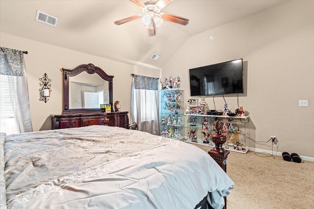 carpeted bedroom featuring ceiling fan and vaulted ceiling