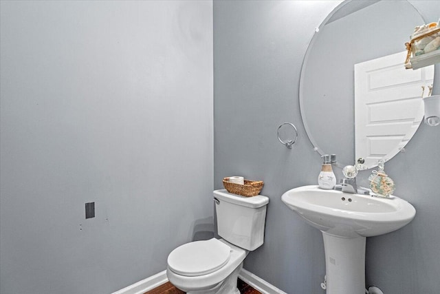 bathroom featuring toilet