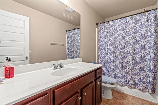 bathroom with walk in shower, vanity, and toilet