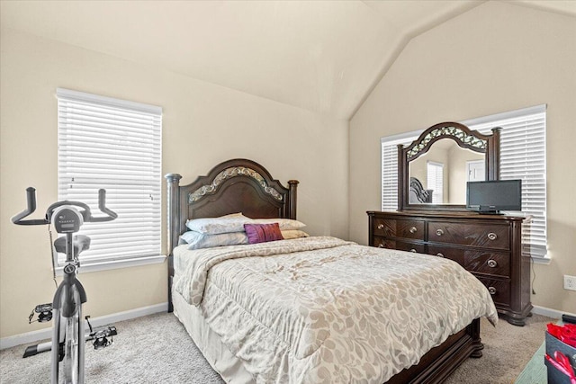 bedroom with light carpet and vaulted ceiling