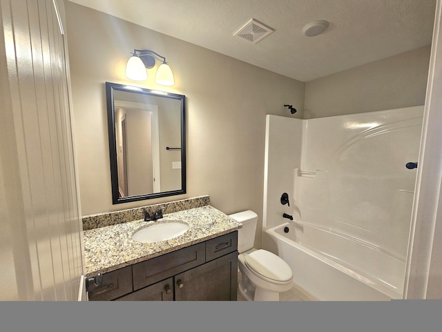 bathroom featuring toilet, shower / tub combination, vanity, and visible vents