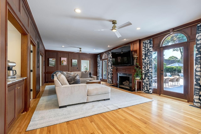 3489 Evans To Locks Rd, Martinez, GA 30907 - living area featuring a fireplace, ceiling fan, light wood-style floors, ornamental molding, and recessed lighting