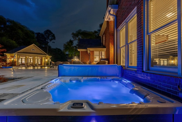 3489 Evans To Locks Rd, Martinez, GA 30907 - pool at night with a hot tub and a patio