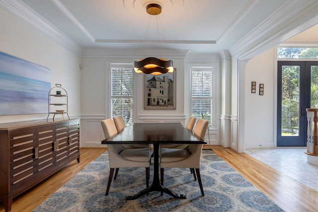 3489 Evans To Locks Rd, Martinez, GA 30907 - dining space featuring healthy amount of natural light, light wood-style floors, a decorative wall, wainscoting, and a tray ceiling