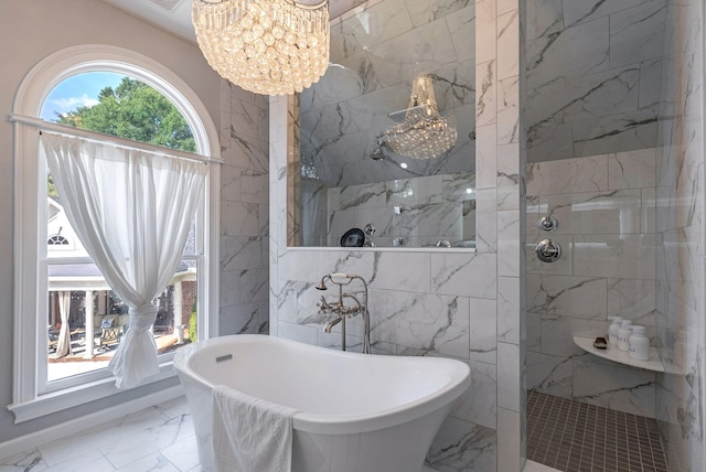 3489 Evans To Locks Rd, Martinez, GA 30907 - full bath with marble finish flooring, a soaking tub, a marble finish shower, a chandelier, and tile walls