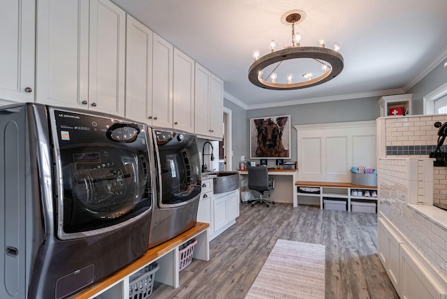 3489 Evans To Locks Rd, Martinez, GA 30907 - washroom with washing machine and dryer, ornamental molding, wood finished floors, a desk, and a chandelier