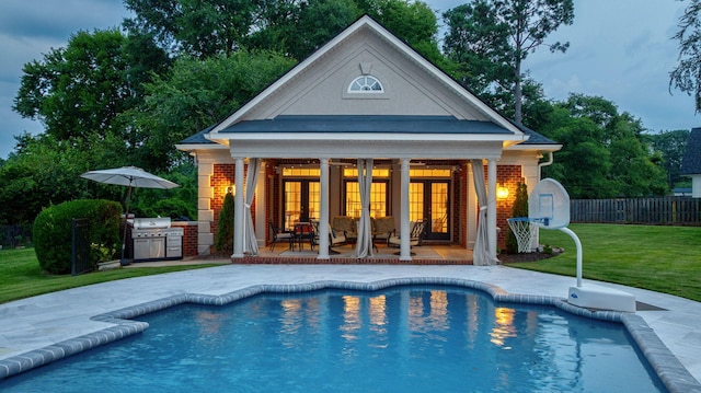 3489 Evans To Locks Rd, Martinez, GA 30907 - view of pool featuring a patio area, an outdoor structure, grilling area, and a storage structure
