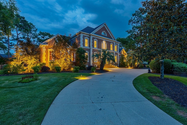 3489 Evans To Locks Rd, Martinez, GA 30907 - georgian-style home with curved driveway, a front lawn, and brick siding