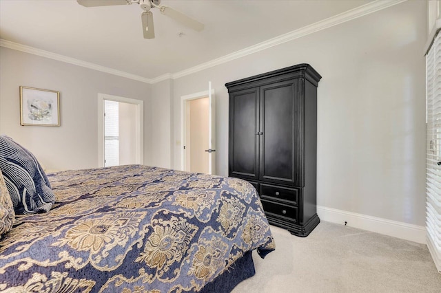 bedroom featuring light carpet, ceiling fan, and crown molding