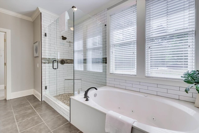 bathroom featuring tile patterned flooring, separate shower and tub, and crown molding