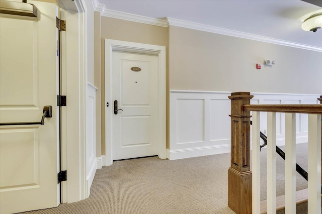 corridor with light carpet and ornamental molding