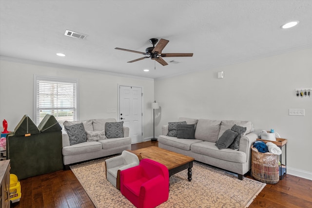 living room with ceiling fan, ornamental molding, and dark wood-type flooring