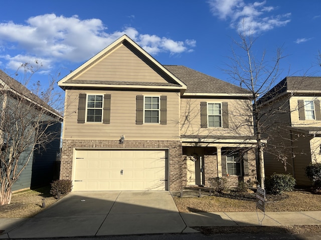 view of front of property featuring a garage