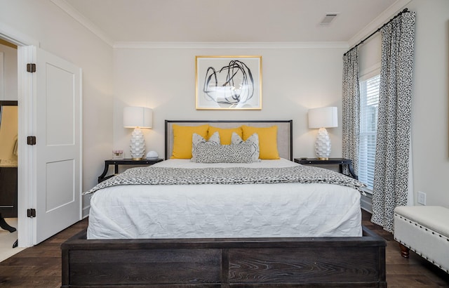 bedroom featuring dark hardwood / wood-style flooring and crown molding