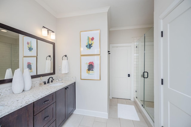 bathroom featuring tile patterned flooring, vanity, a shower with door, and crown molding