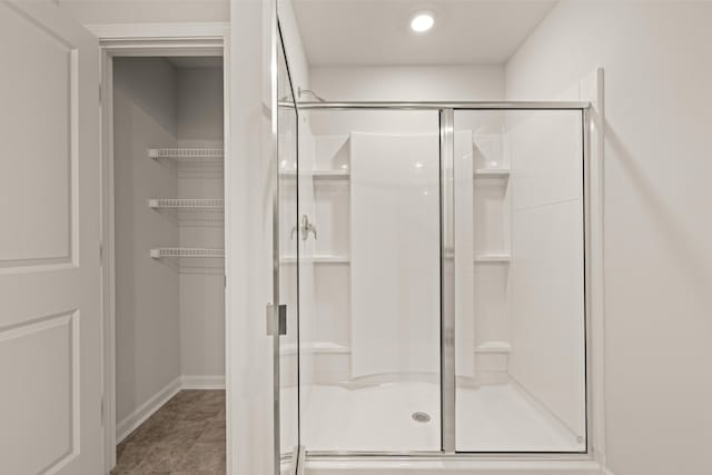 bathroom featuring walk in shower