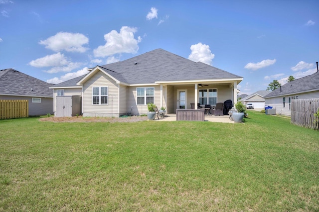 1391 Ackerman Dr, Graniteville, SC 29829 - rear view of property featuring ceiling fan, a patio, a storage shed, and an outbuilding
