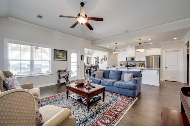 1391 Ackerman Dr, Graniteville, SC 29829 - living area featuring dark wood-style flooring, a ceiling fan, crown molding, recessed lighting, and a chandelier