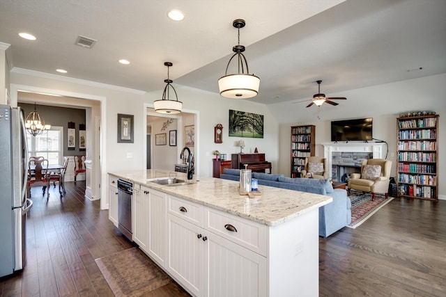 1391 Ackerman Dr, Graniteville, SC 29829 - kitchen with a sink, stainless steel appliances, a ceiling fan, crown molding, and white cabinetry