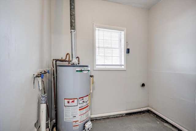 utility room with gas water heater