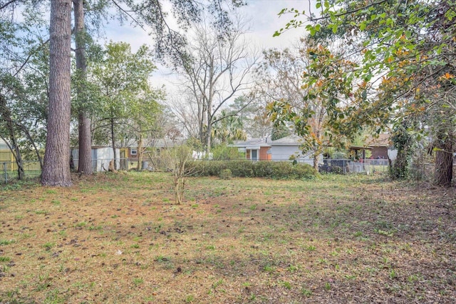 view of yard featuring fence