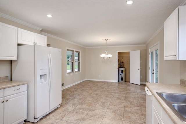 1702 Forest Creek Rd, Augusta, GA 30909 - kitchen featuring white appliances, water heater, a chandelier, ornamental molding, and white cabinetry