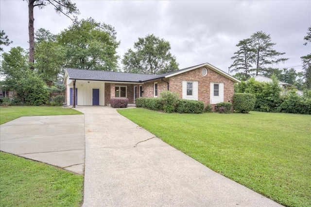 1702 Forest Creek Rd, Augusta, GA 30909 - single story home with brick siding, driveway, a front yard, an attached carport, and a shingled roof