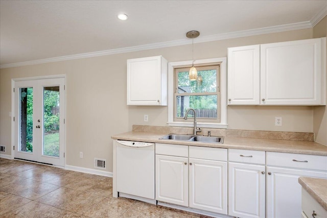 1702 Forest Creek Rd, Augusta, GA 30909 - kitchen featuring white dishwasher, ornamental molding, white cabinetry, light countertops, and decorative light fixtures