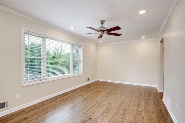 1702 Forest Creek Rd, Augusta, GA 30909 - empty room with wood finished floors, a ceiling fan, ornamental molding, and recessed lighting