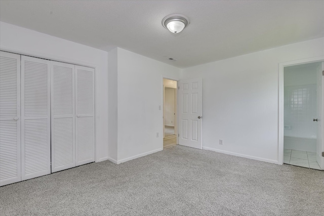 4102 Sapling Ln, Augusta, GA 30906 - unfurnished bedroom with carpet flooring, baseboards, a closet, and ensuite bath