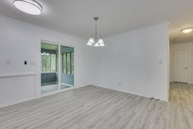 4102 Sapling Ln, Augusta, GA 30906 - unfurnished room with wood finished floors, a chandelier, and baseboards