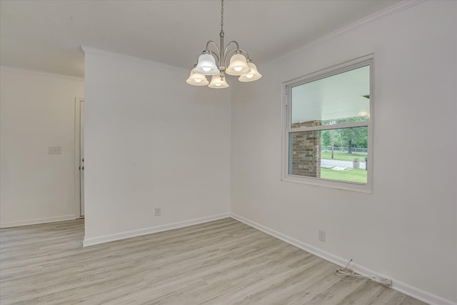 4102 Sapling Ln, Augusta, GA 30906 - spare room with crown molding, a chandelier, light wood-style floors, and baseboards