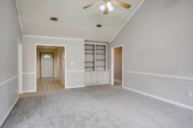 4593 Ashbrook Ct, Martinez, GA 30907 - empty room with light colored carpet, a ceiling fan, ornamental molding, built in shelves, and baseboards