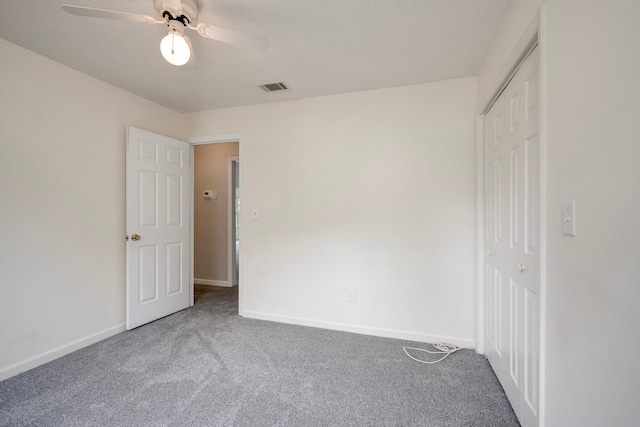 4593 Ashbrook Ct, Martinez, GA 30907 - unfurnished bedroom featuring carpet floors, a closet, baseboards, and ceiling fan