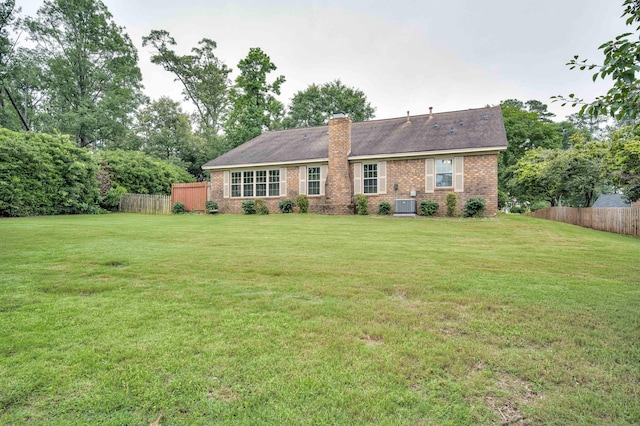4593 Ashbrook Ct, Martinez, GA 30907 - rear view of property featuring brick siding, a chimney, and cooling unit