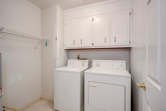 4593 Ashbrook Ct, Martinez, GA 30907 - laundry room featuring separate washer and dryer, cabinet space, and baseboards