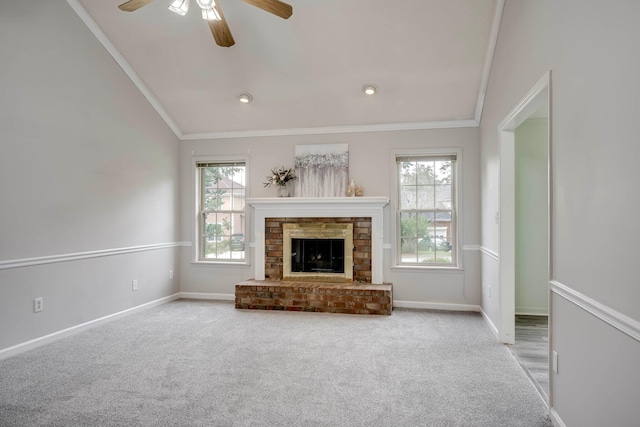 4593 Ashbrook Ct, Martinez, GA 30907 - unfurnished living room with ornamental molding, a ceiling fan, carpet floors, a stone fireplace, and baseboards