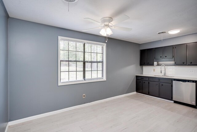 2323 Basswood Dr, Augusta, GA 30906 - kitchen with stainless steel dishwasher, a sink, light wood finished floors, and ceiling fan