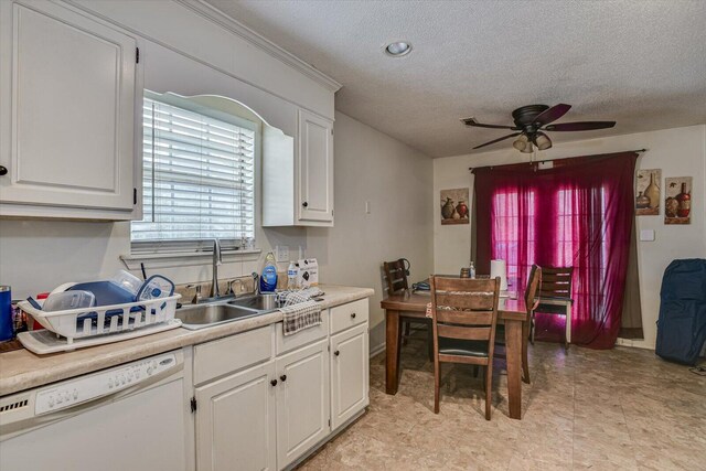 kitchen featuring a sink, white cabinetry, a ceiling fan, light countertops, and dishwasher