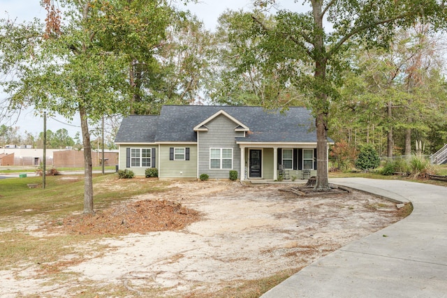 single story home featuring a porch