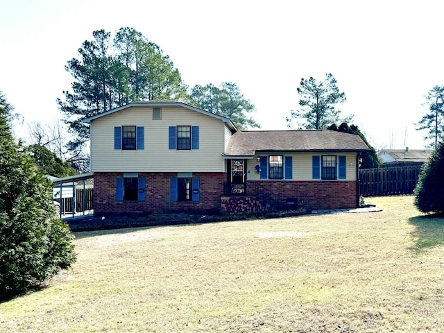 tri-level home featuring a front yard