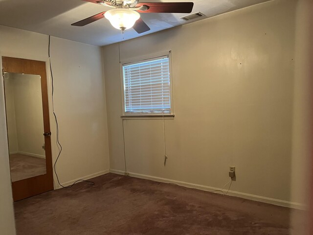 3323 Young Forest Dr, Augusta, GA 30906 - empty room with a ceiling fan and dark colored carpet