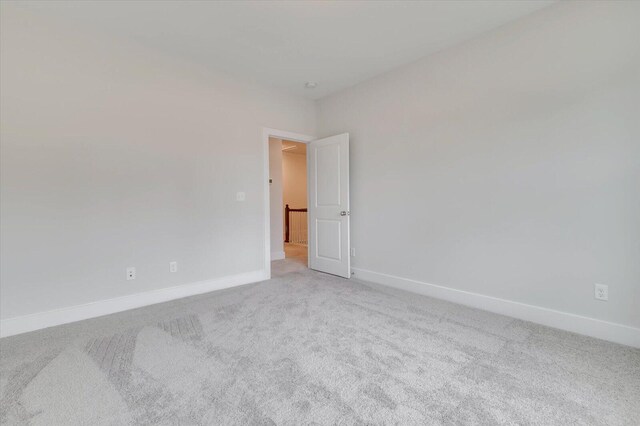 empty room featuring carpet flooring