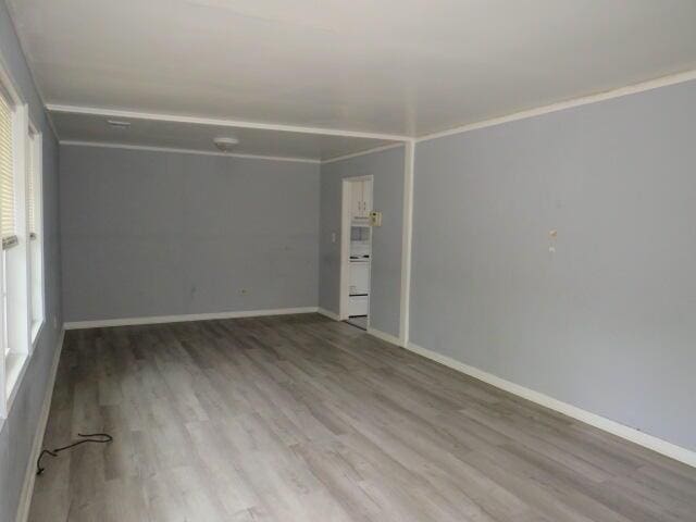 2629 Richmond Hill Rd, Augusta, GA 30906 - empty room featuring baseboards, crown molding, and wood finished floors