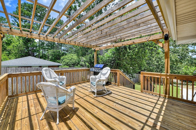 141 Whaley St, Warrenville, SC 29851 - deck with a pergola, view of scattered trees, and grilling area