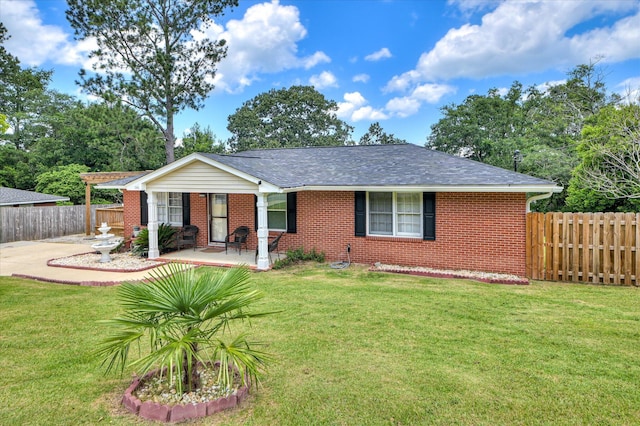 141 Whaley St, Warrenville, SC 29851 - view of front of house with brick siding, covered porch, and roof with shingles