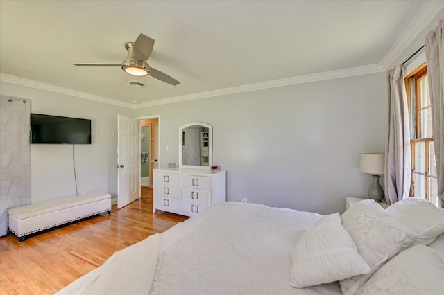 141 Whaley St, Warrenville, SC 29851 - bedroom with crown molding, light wood-type flooring, and ceiling fan