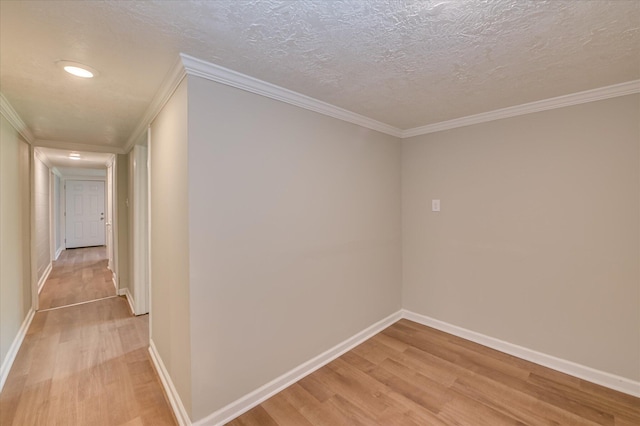 141 Whaley St, Warrenville, SC 29851 - hall featuring light wood-type flooring, ornamental molding, recessed lighting, and a textured ceiling